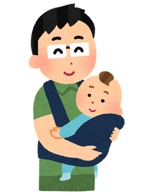 抱っこ紐で赤ちゃんを抱っこする父親
